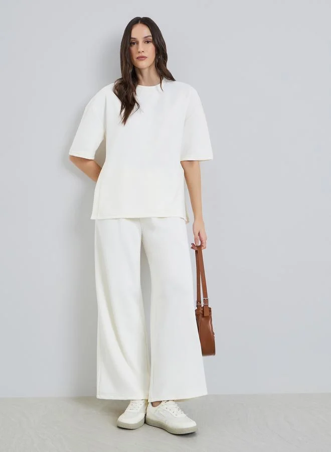 Styli  Women Off White Wide Leg Joggers for Women | Best Price UAE